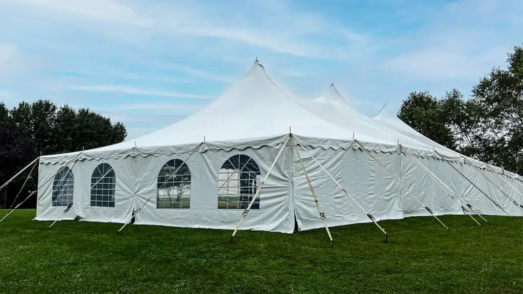 For winter parties outside, a heated tent rental setup with a big white event tent provides warmth and comfort.