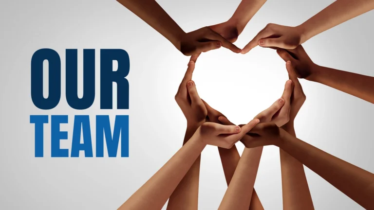 Hands forming a heart symbol representing teamwork and unity with the text 'Our Team'.