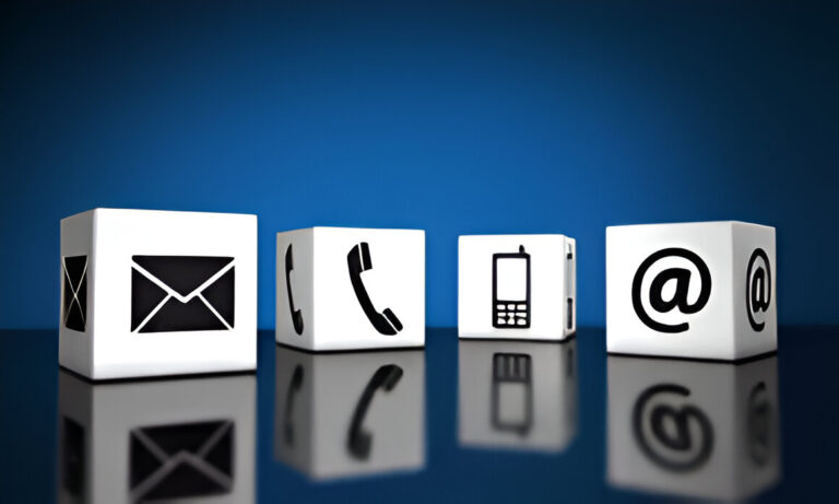 Set of communication icons including email, phone, mobile, and social media symbols on white cubes. Represents diverse contact methods in modern communication.