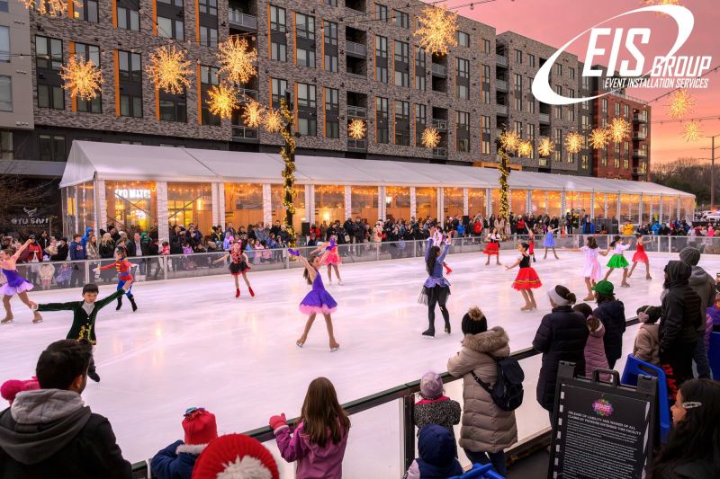 Skaters perform on an outdoor ice rink under clear event tents, showing how Tents Outdoor create warm festival spaces.